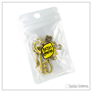 Gold Key Charms x 7