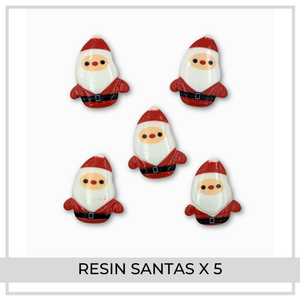 Resin Santas x 5